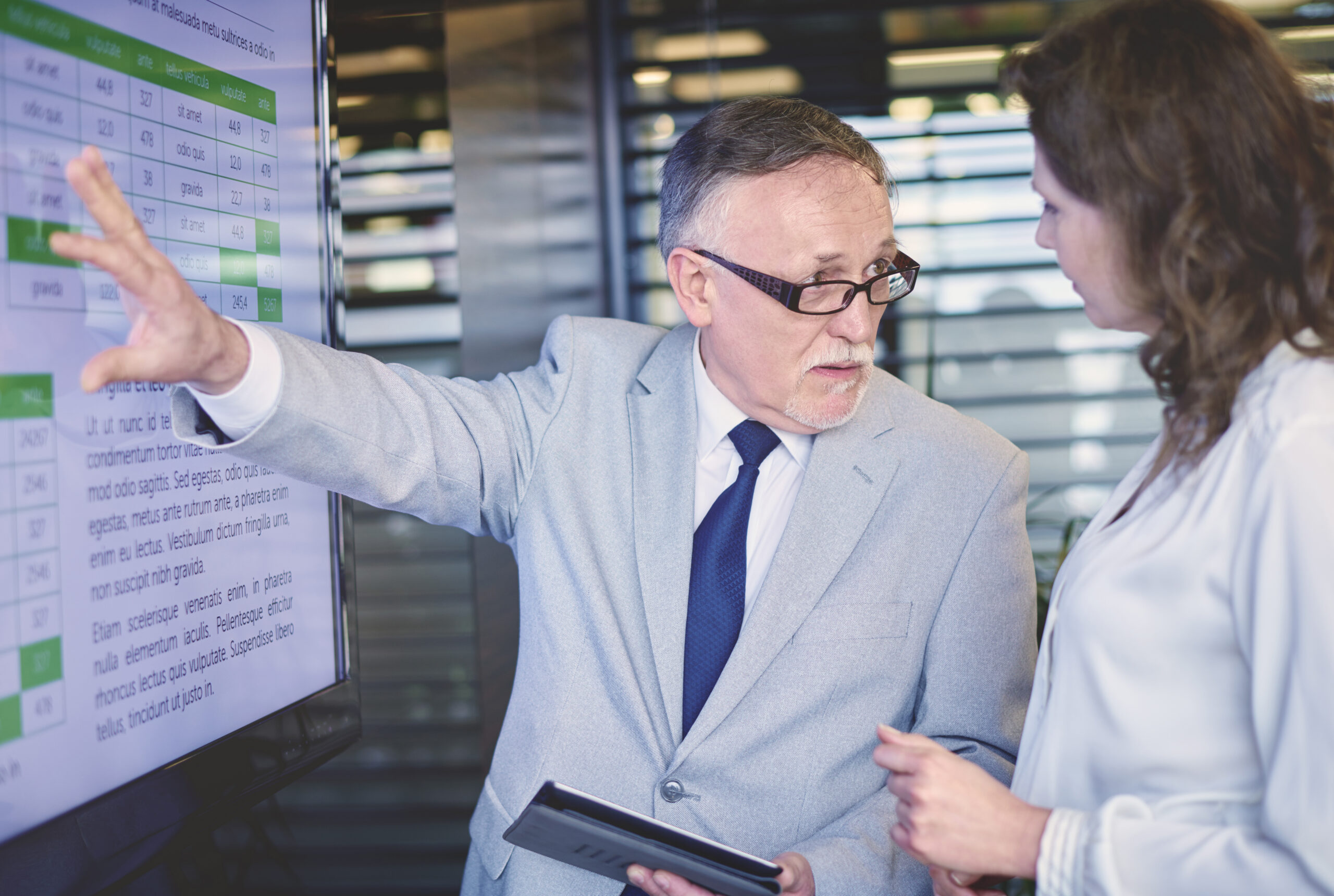 Business team reviewing product listing performance presentation